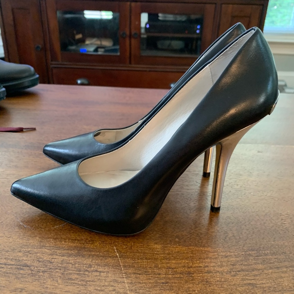 Michael Kors black stilettos metal heel size 7